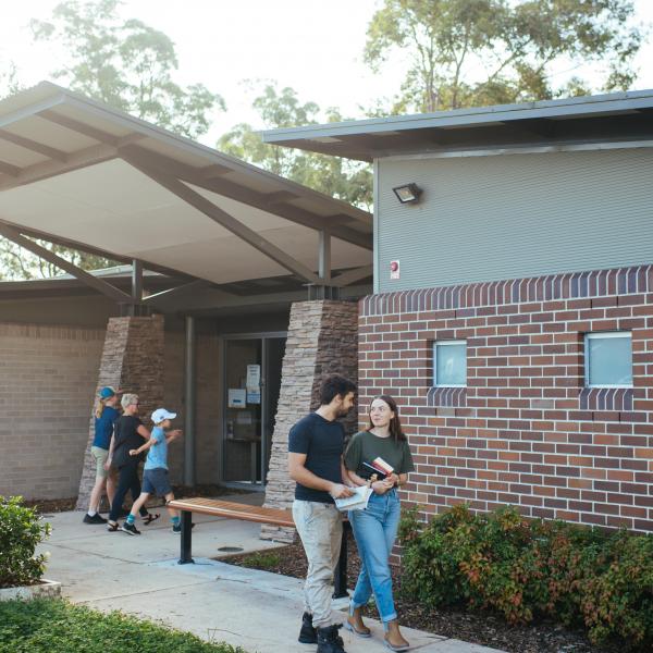 Couple walking out of the library