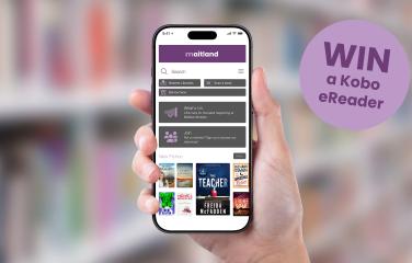 hand holding a phone with library app