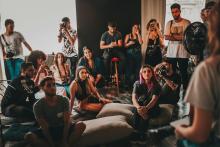 Group of people listening to author talk